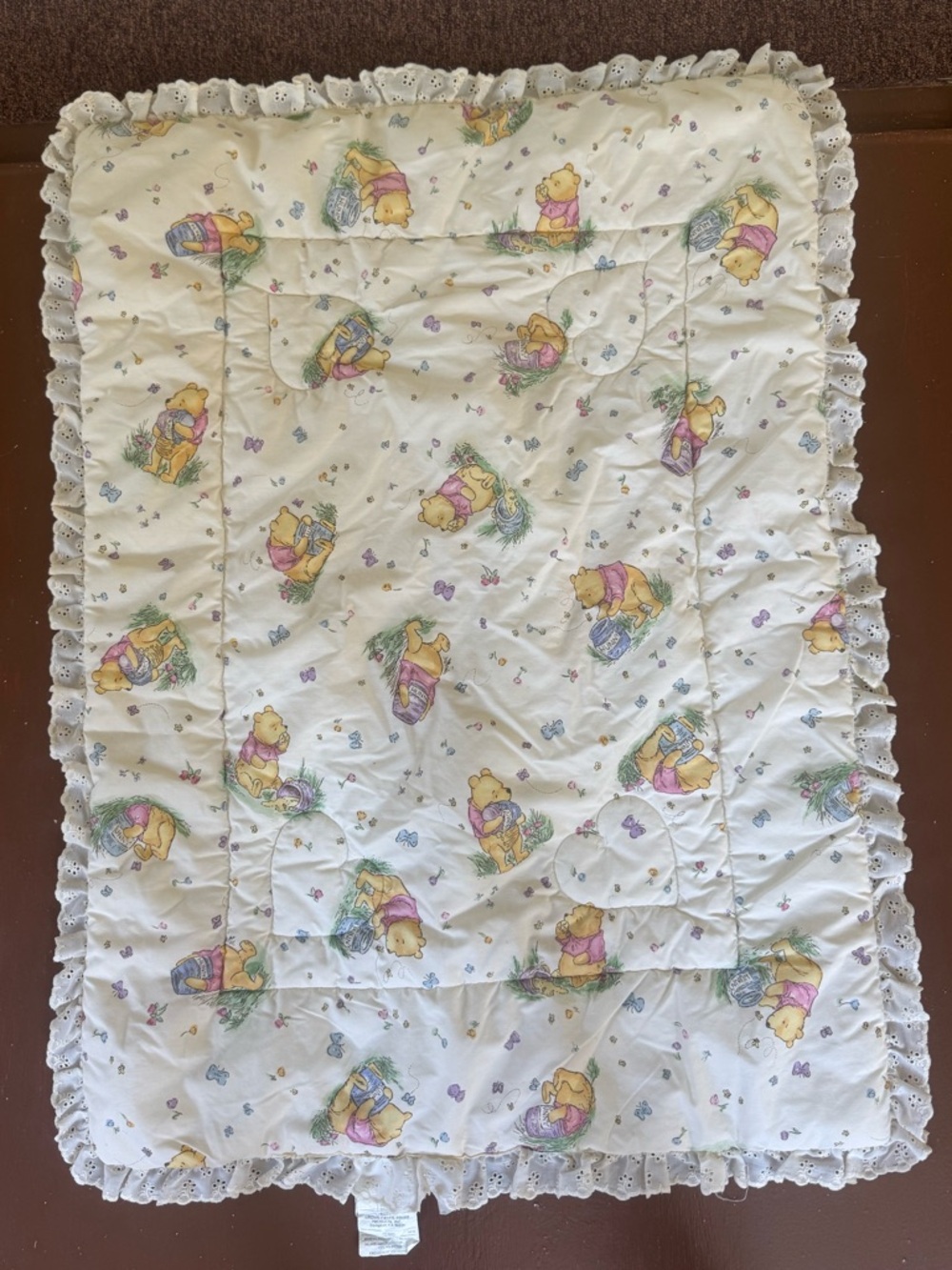 Classic Pooh Cream Baby Quilt with Ruffled Edge